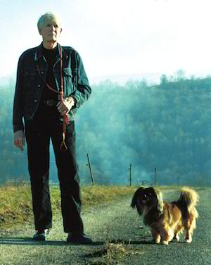 Stafford Whiteaker and his dog near his home in the South of France