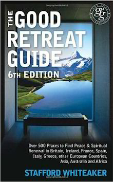 Cover of The Good Retreat Guide 6th Edition showing a peaceful mountain lake in front of a distance snow-capped peak. The book lists over 500 retreats.